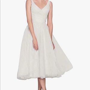 White chiffon wedding or prom dress.